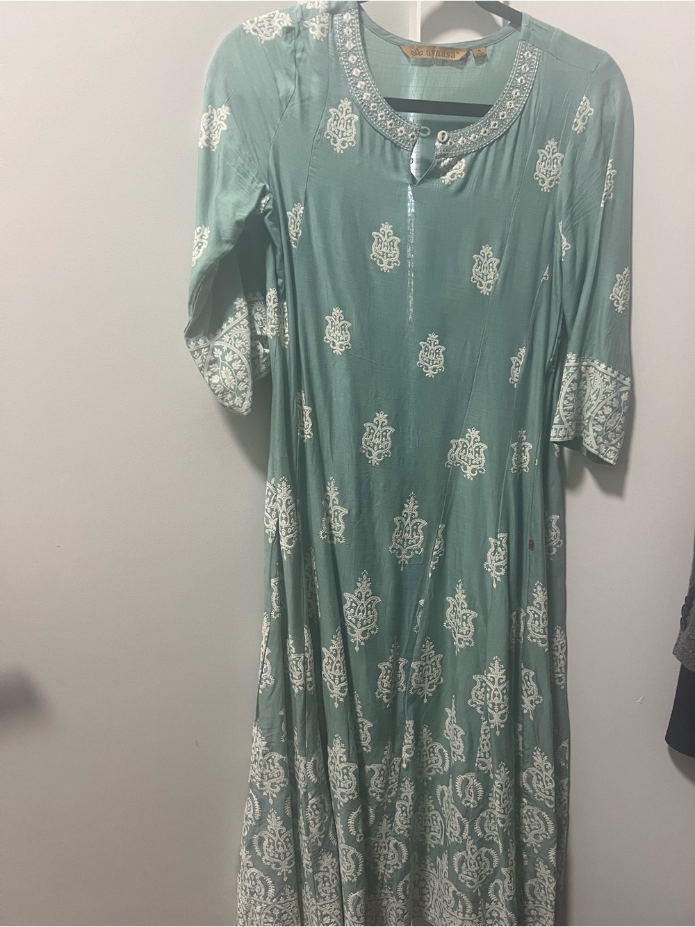 Elegant Teal Printed Maxi Dress with Embroidered Neckline